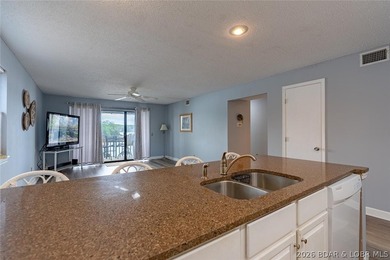 Imagine waking up to miles of sparkling lake views stretching - photo 9