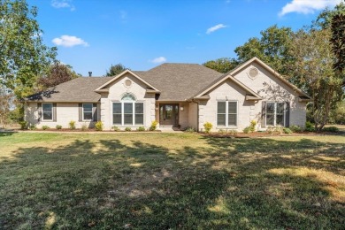 Discover nearly 20 acres of serene living just outside the city - Lake Home For Sale in Mount Vernon, Texas