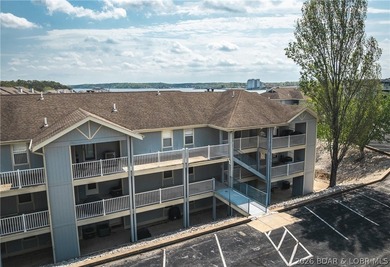 Enjoy stunning lake views from your screened-in deck overlooking - photo 1