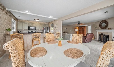 Enjoy stunning lake views from your screened-in deck overlooking - photo 8