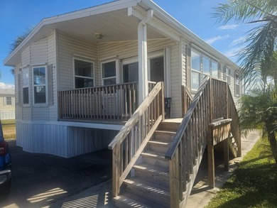 Fully Remodeled 2BR/2BA Corner Lot with Water Views - 55+ - photo 1