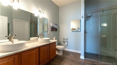 Experience refined lakefront living in this fully updated - photo 14