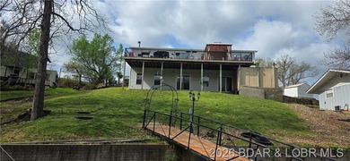 Large lakefront family home tucked back in a protective cove for - photo 5
