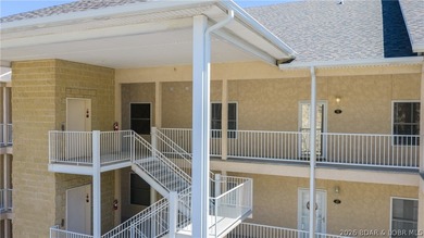 Experience refined lakefront living in this fully updated - photo 23