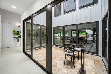 Set on one of the neighborhood's most impressive lots, this - photo 32