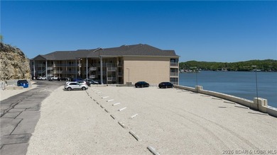Experience refined lakefront living in this fully updated - photo 33