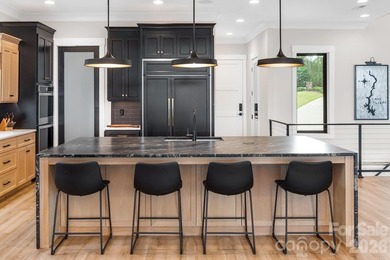 This architecturally stunning waterfront residence is a - photo 12