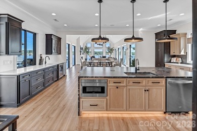 This architecturally stunning waterfront residence is a - photo 13