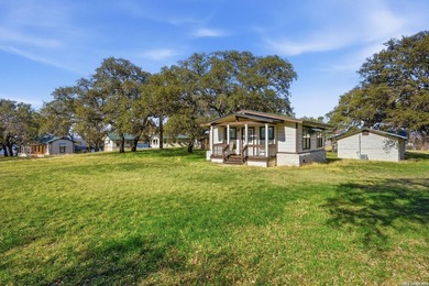 564' of Lake Buchanan shoreline. 6.3 acres. Eleven cabins. This - photo 11
