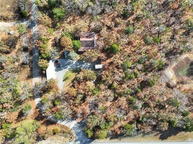 Tucked away in the hills of Southeastern Oklahoma, next to - photo 2