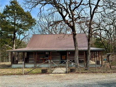 Tucked away in the hills of Southeastern Oklahoma, next to - photo 3