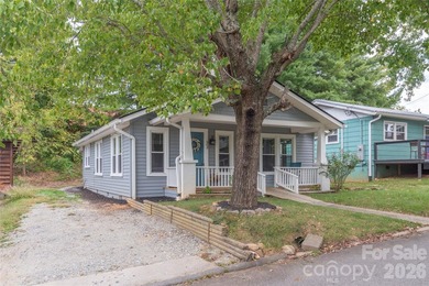 Welcome home to this charming 2-bedroom, 1-bath bungalow nestled - photo 1