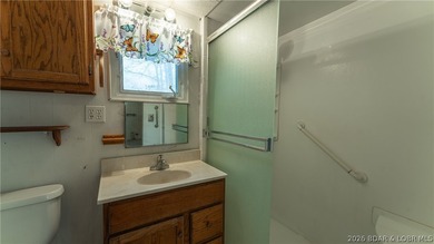 Discover affordable lake living at its best! Nestled in a - photo 11