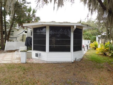 This fabulous RV site features golf course views with a concrete - photo 11