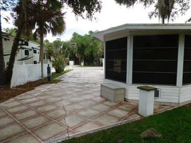 This fabulous RV site features golf course views with a concrete - photo 15