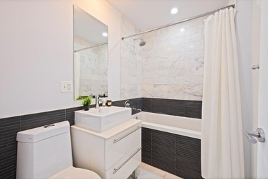 JUST LISTED Fully Renovated 2BR/2BA with Custom Kitchen Island & - photo 6