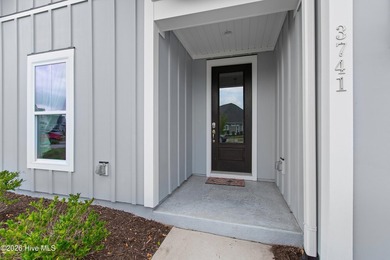 Coastal living at its best! This beautifully designed one-level - photo 3