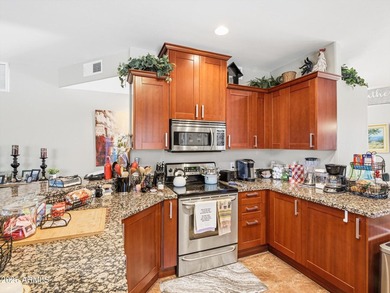 FULLY FURNISHED. Enjoy living in this FIRST-Floor Condo in - photo 16