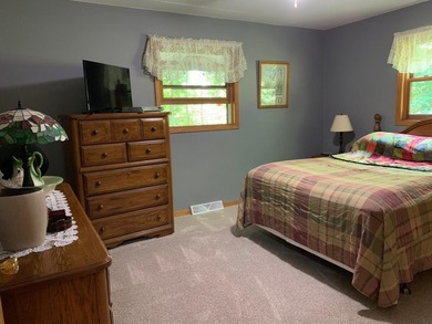 This 3 bedroom, 2 bath home is located in a parklike setting on - photo 25