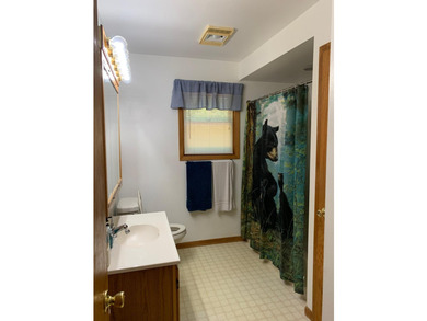 This 3 bedroom, 2 bath home is located in a parklike setting on - photo 27