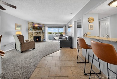 Fresh, clean & updated 2-level condo in the highly desirable - photo 1