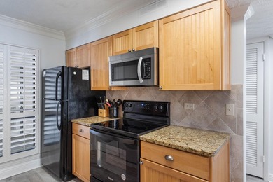 Experience elevated coastal living from this penthouse-level - photo 13