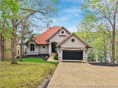 Completely updated from top to bottom, this luxury lakefront - photo 2