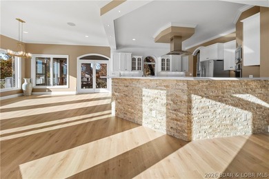 Completely updated from top to bottom, this luxury lakefront - photo 9