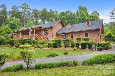 Nestled within the exclusive gated Lake Rhodhiss community of - photo 1