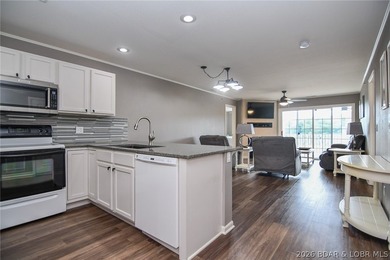 This is the perfect lakefront condo just in time for summer! - photo 2
