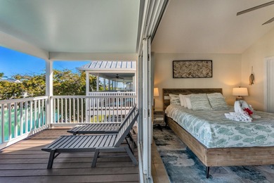 Experience Florida Keys waterfront living in this beautifully - photo 17