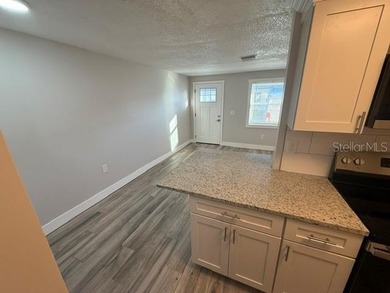 This sunlit 2-bed, 1-bath villa near the Gulf Coast offers the - photo 3