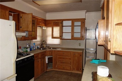 Two bedroom, 1.5 baths. This home includes a building in the - photo 11