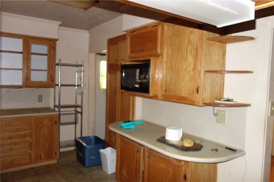 Two bedroom, 1.5 baths. This home includes a building in the - photo 12