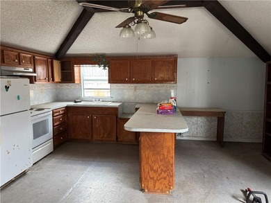Two bedroom, 1.5 baths. This home includes a building in the - photo 20