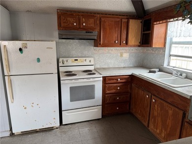 Two bedroom, 1.5 baths. This home includes a building in the - photo 21