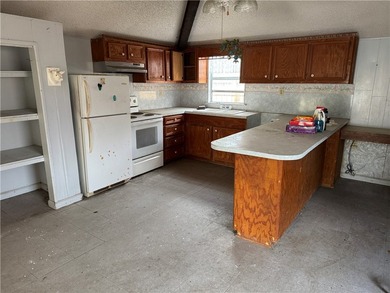 Two bedroom, 1.5 baths. This home includes a building in the - photo 23