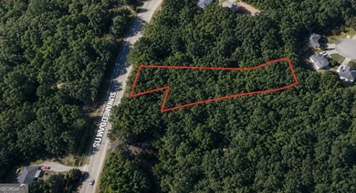 Discover an exceptional opportunity to own 1.24 acres in the - photo 2