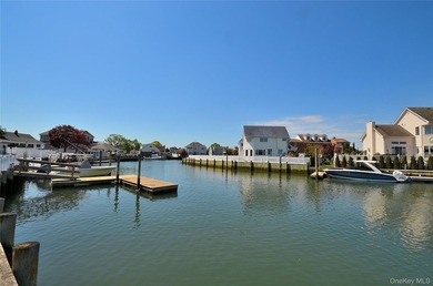Waterfront opportunity in Wantagh, NY! This spacious 6-bedroom - photo 1
