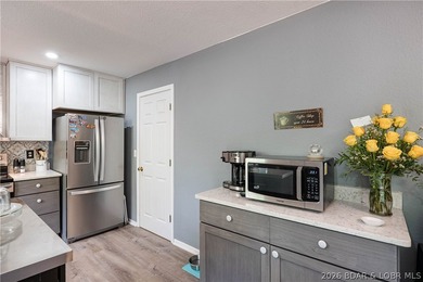Beautifully updated and move-in ready, this 4-bedroom, 3-bath - photo 5
