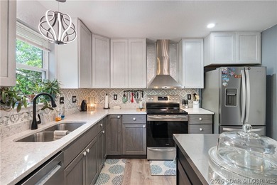 Beautifully updated and move-in ready, this 4-bedroom, 3-bath - photo 6