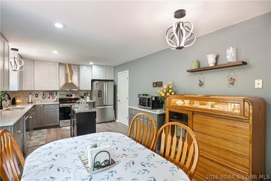 Beautifully updated and move-in ready, this 4-bedroom, 3-bath - photo 9
