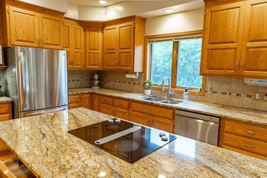 Impeccably maintained home in a picturesque May Township setting - photo 9
