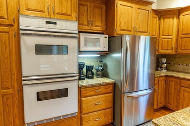 Impeccably maintained home in a picturesque May Township setting - photo 10