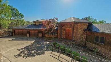 Lodge-style lakefront retreat sitting on over 1 acre with an - photo 4