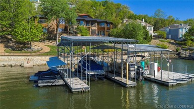 Lodge-style lakefront retreat sitting on over 1 acre with an - photo 6