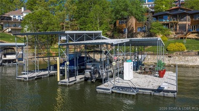 Lodge-style lakefront retreat sitting on over 1 acre with an - photo 7