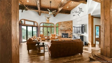 Lodge-style lakefront retreat sitting on over 1 acre with an - photo 8