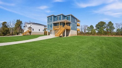 Waterfront | Brand New Coastal Construction | Move-In Ready - photo 1