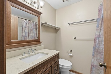 Enjoy easy main-floor living with beautiful golf course views - photo 18